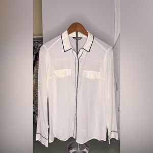 Cream and black button down blouse
by EXPRESS Sz M